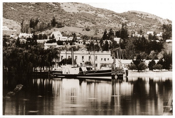 Historic Eichardt's image with Lake Wakatipu and boat